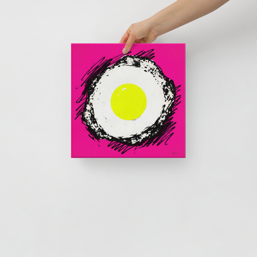 'Sunny Side Pop' — a Pop art print. A vibrant pop art illustration of a fried egg with a bright yellow yolk and sketchy black outlines, set against a solid hot pink background, perfect for a modern kitchen.