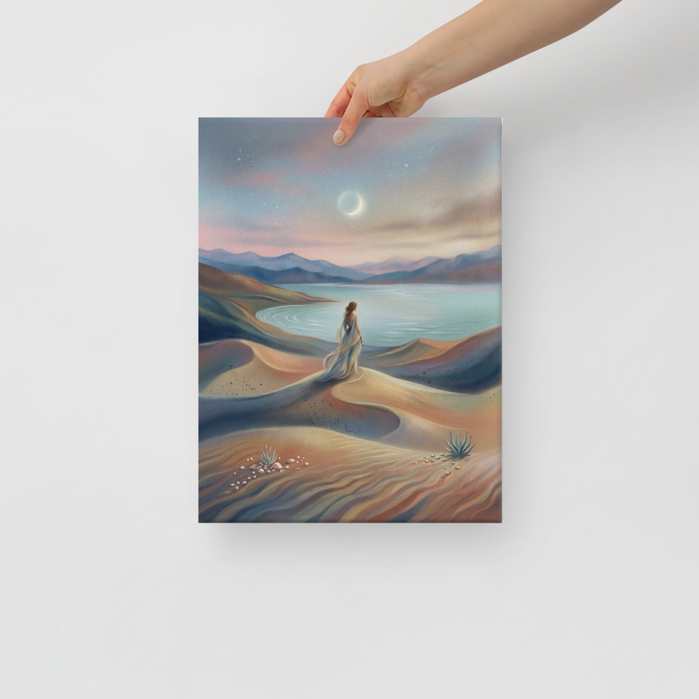 'Desert Moonrise' — a Magic realism print. A woman in a flowing dress standing on rolling sand dunes looking over a turquoise bay toward mountains under a twilight sky with a crescent moon.