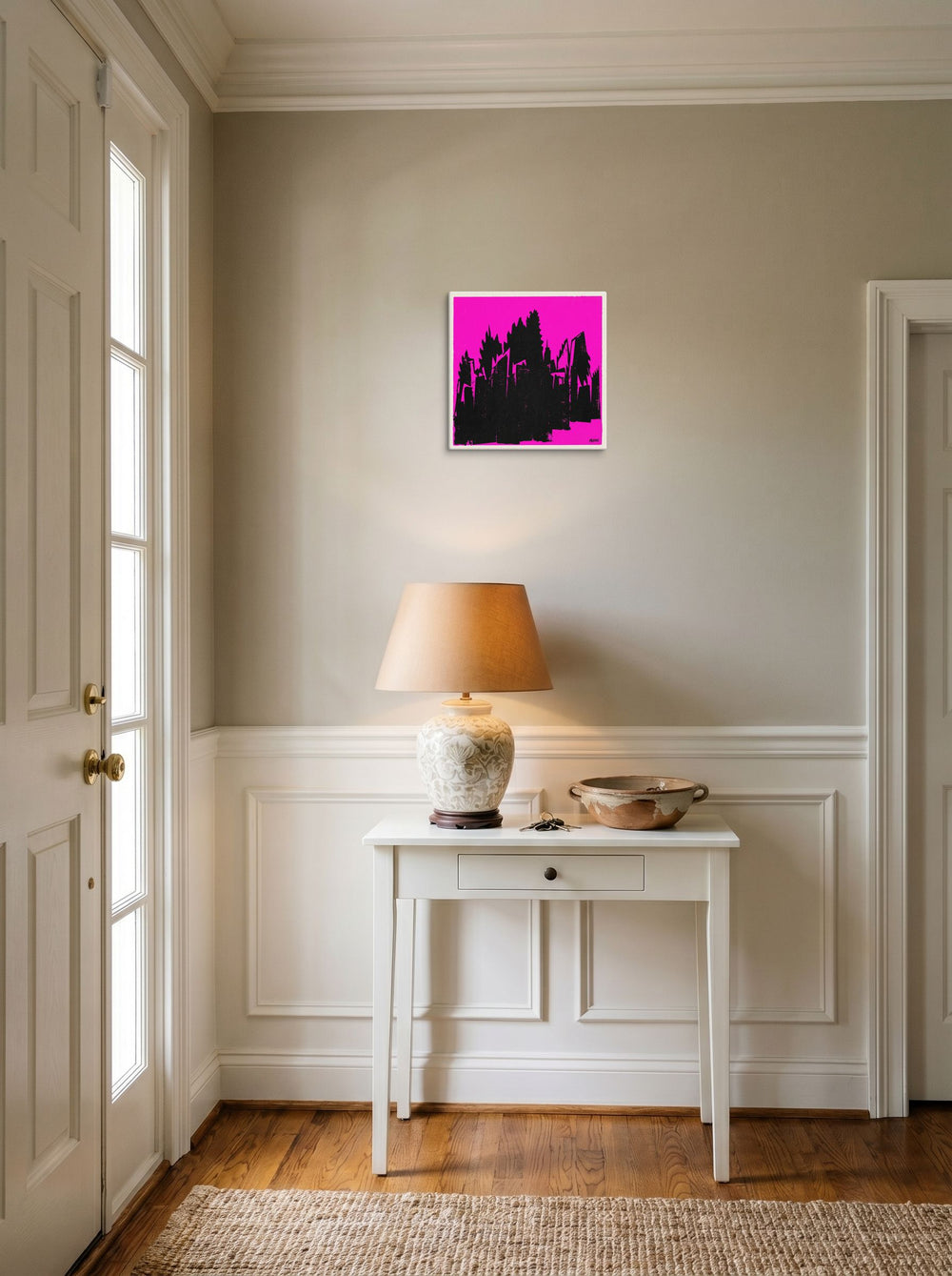 A 12x12 inch canvas Pop art print of 'Neon Urban Decay' hanging in an entryway near a console.