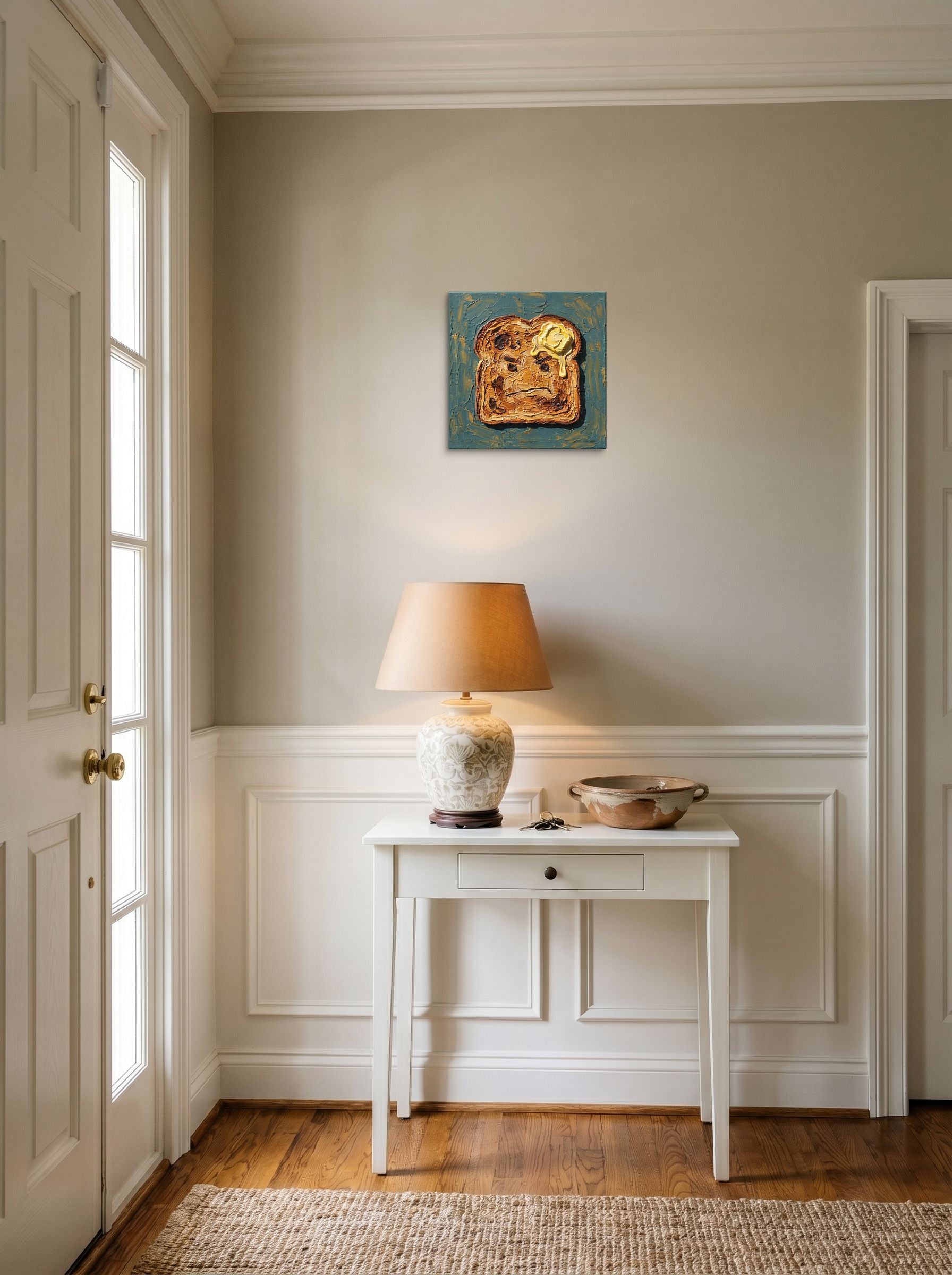 A 12x12 inch canvas Pop art,Lowbrow print of 'Morning Grudge' hanging in an entryway near a console.