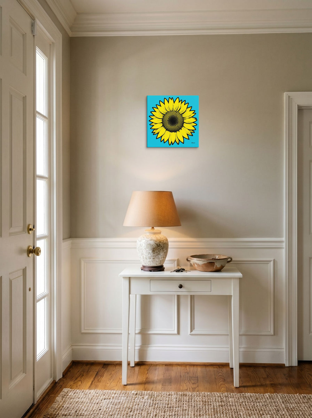 A 12x12 inch canvas Pop art print of 'Cyan Sunflower' hanging in an entryway near a console.