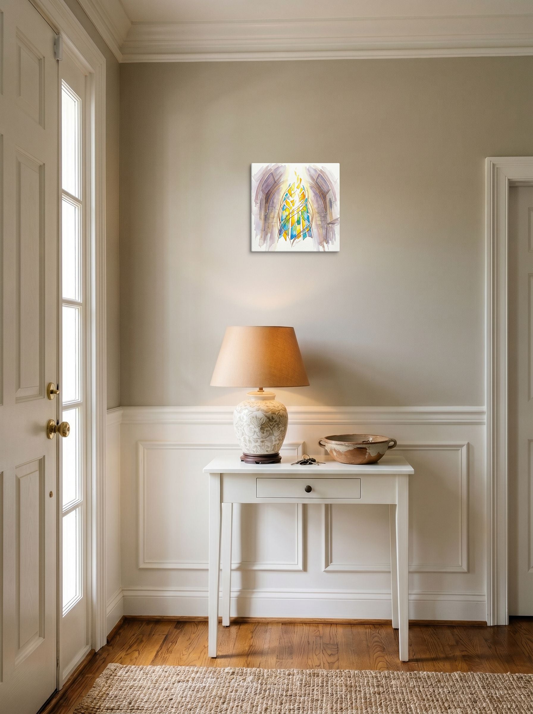 A 12x12 inch canvas Cubism print of 'Family Structure' hanging in an entryway near a console.