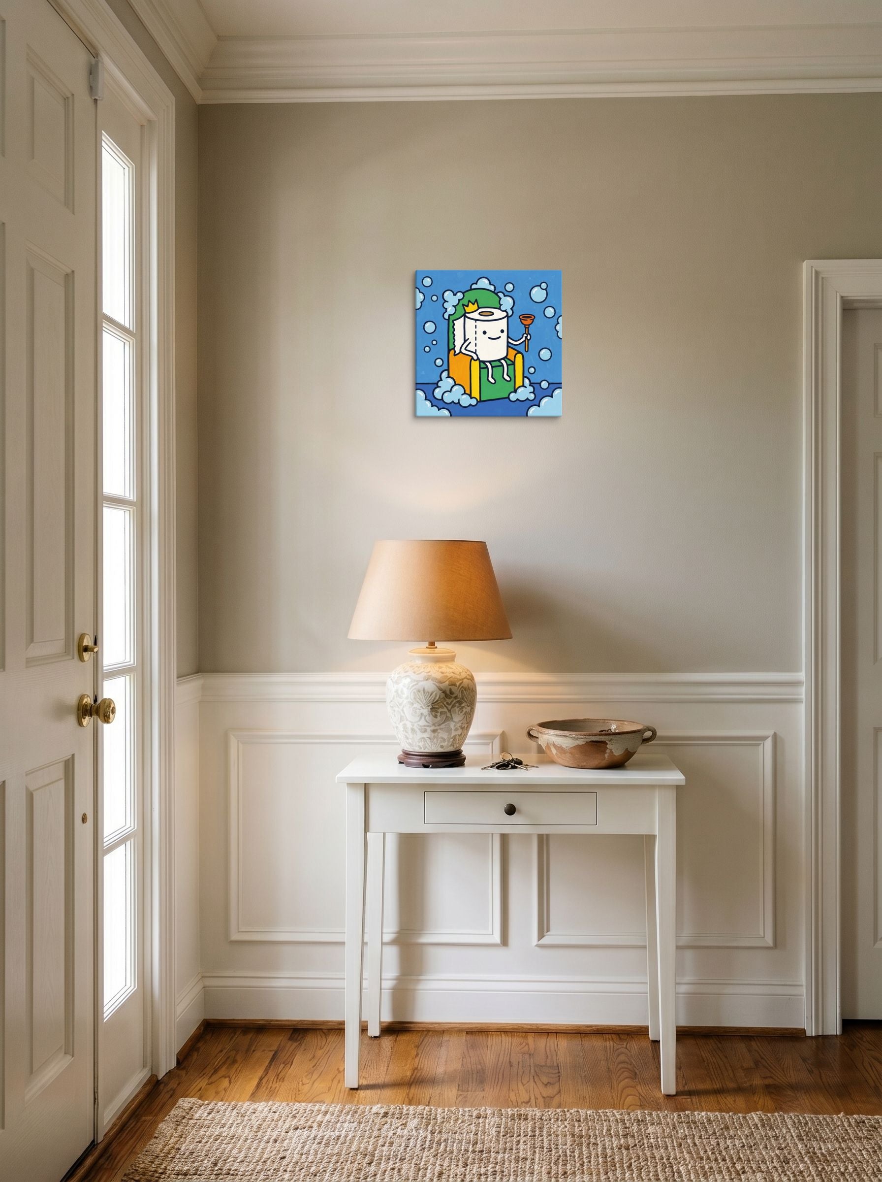 A 12x12 inch canvas Pop art,Cloisonnism print of 'King of the Bathroom' hanging in an entryway near a console.
