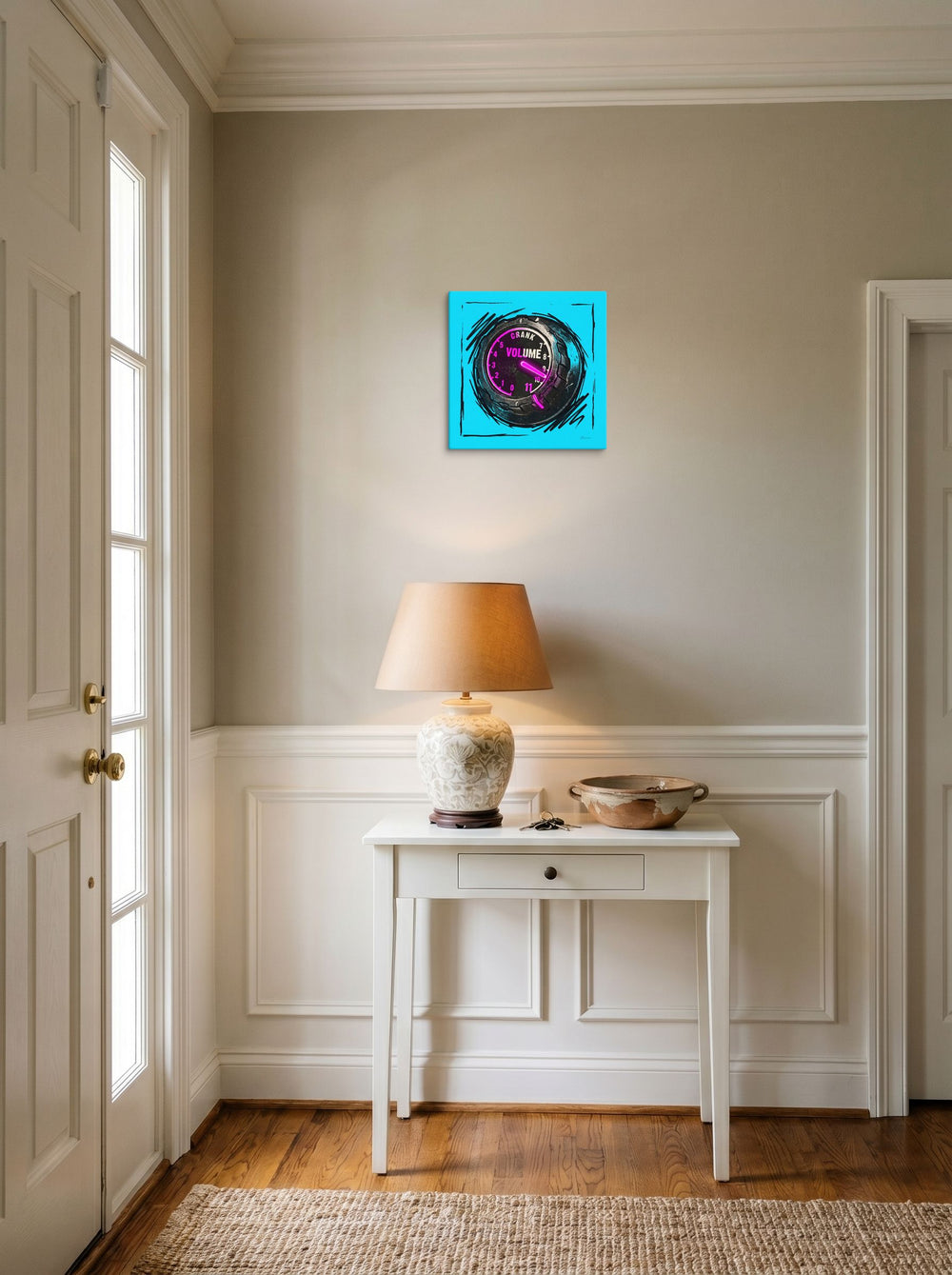 A 12x12 inch canvas Pop art print of 'Crank to Eleven' hanging in an entryway near a console.