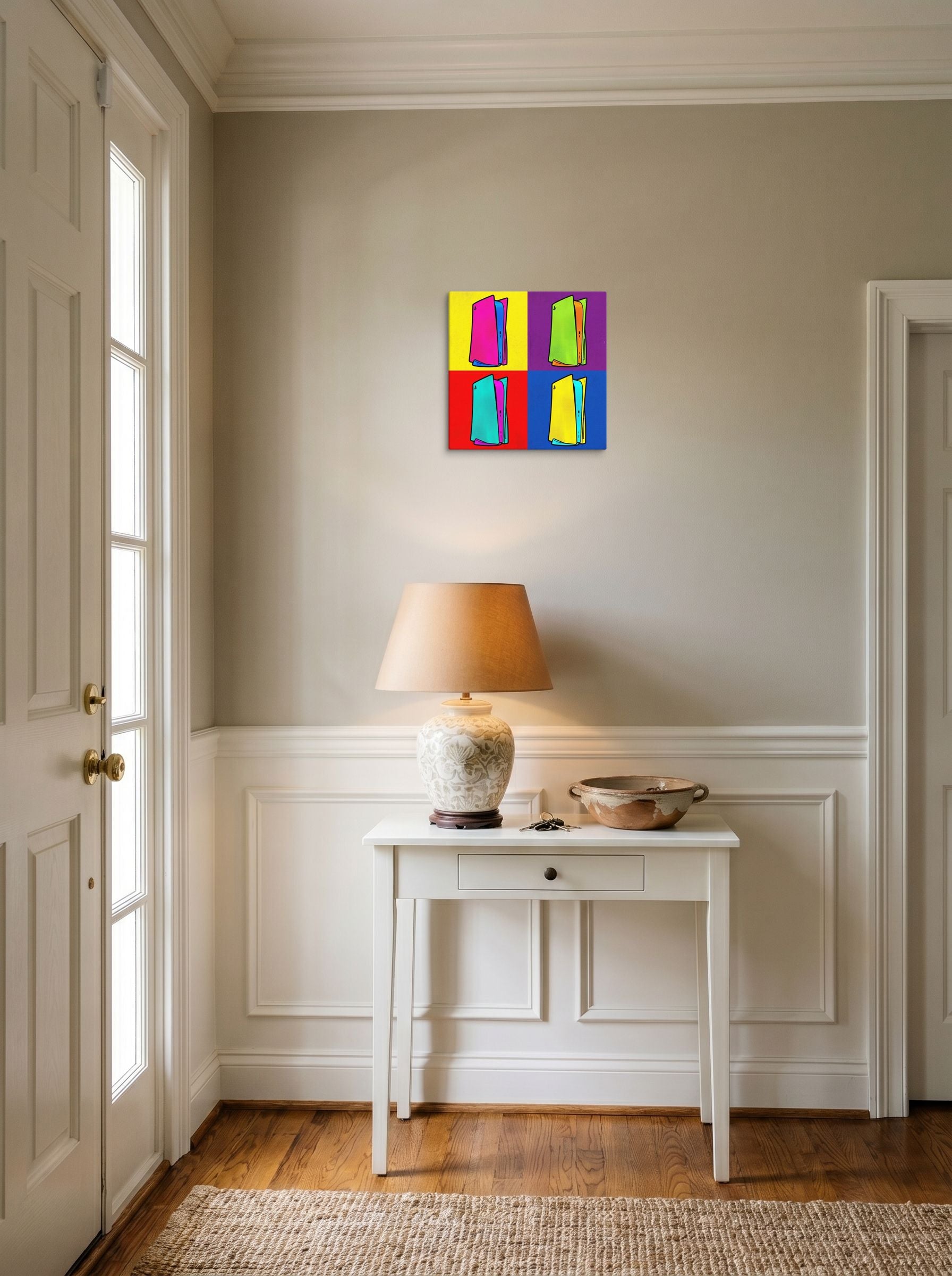 A 12x12 inch canvas Pop art print of 'Next Gen Chroma' hanging in an entryway near a console.