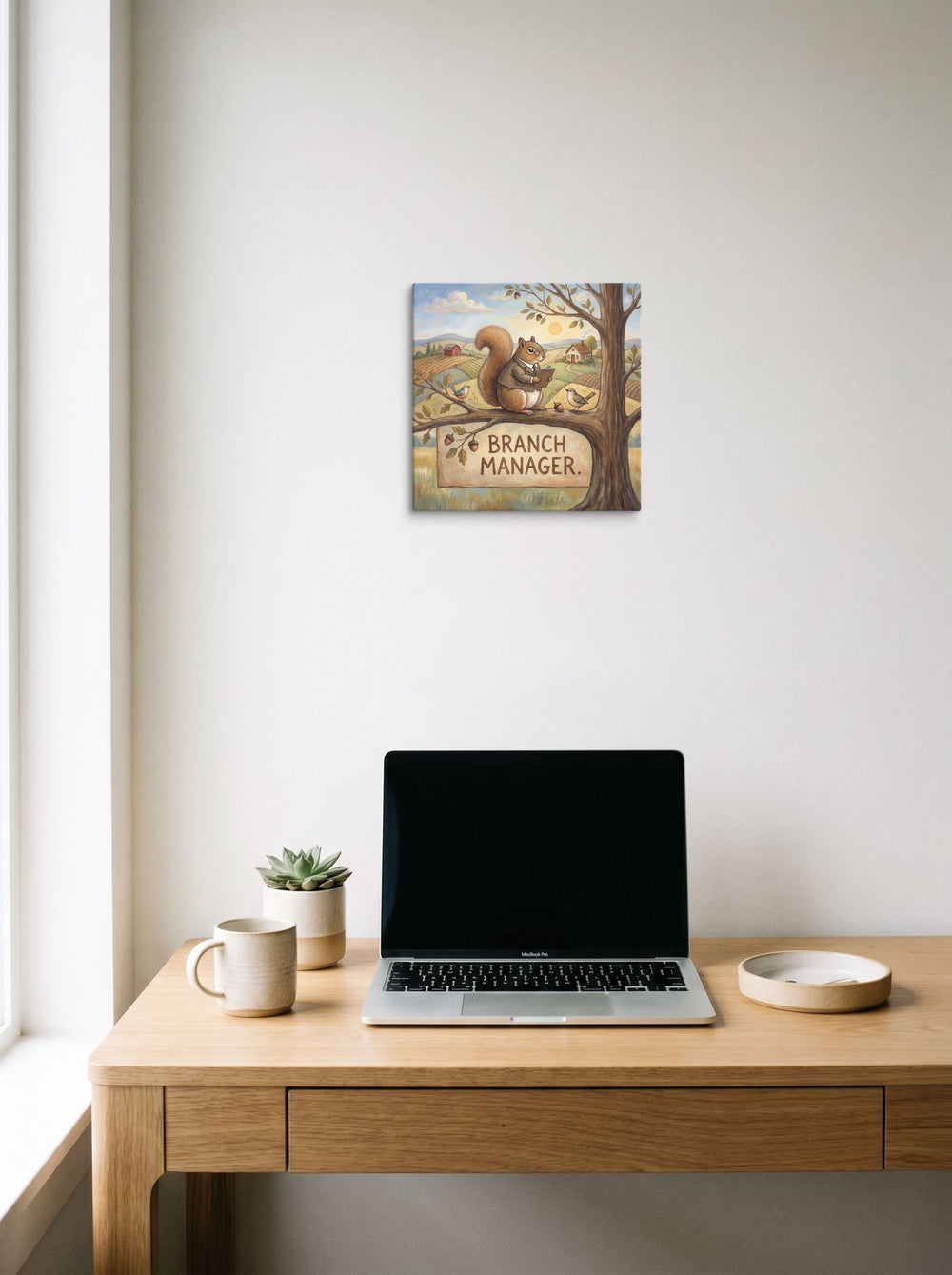 A canvas print of the Folk art artwork 'Branch Manager', displayed over a compact desk setup.