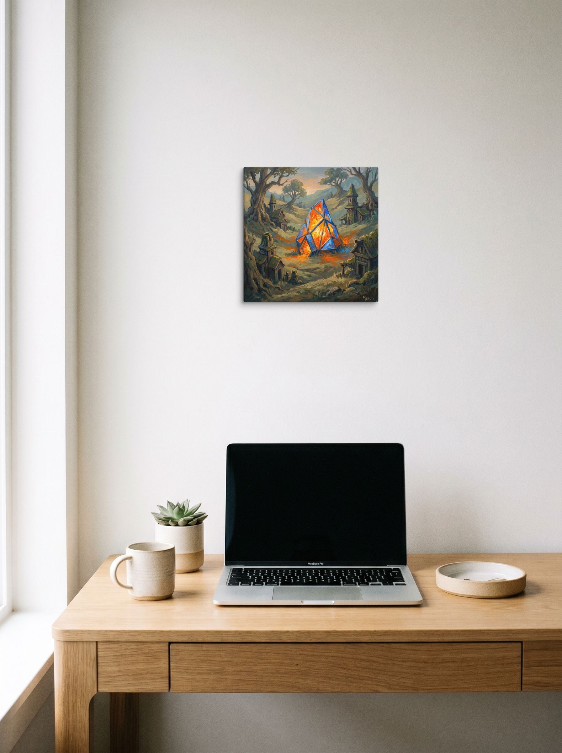 A 12x12 inch canvas Expressionism print of 'The Glowing Heart' hanging above a worktable with a laptop.