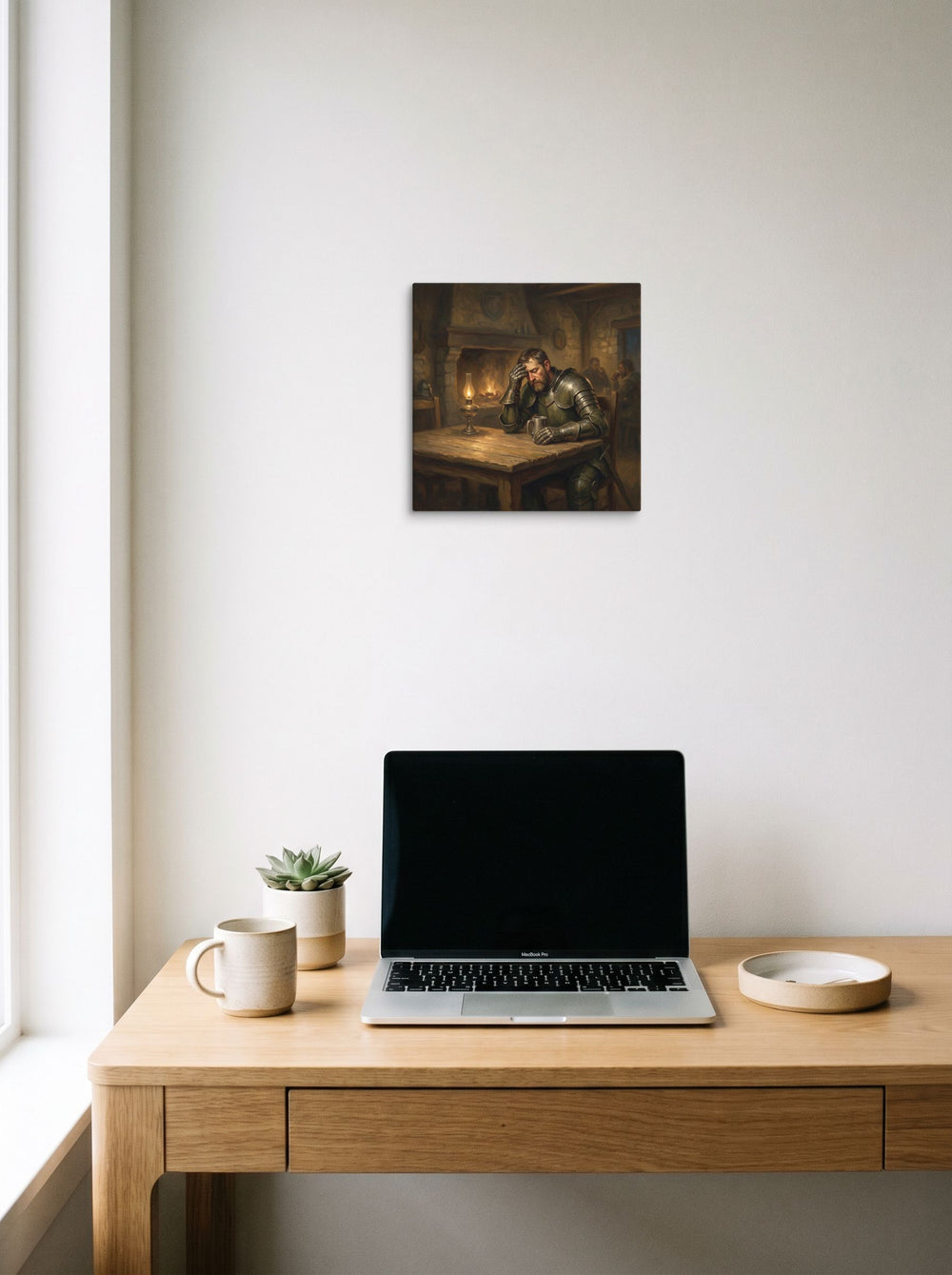 The Realism print 'The Weary Knight', 12x12 inch canvas, styled above a home-office workspace.