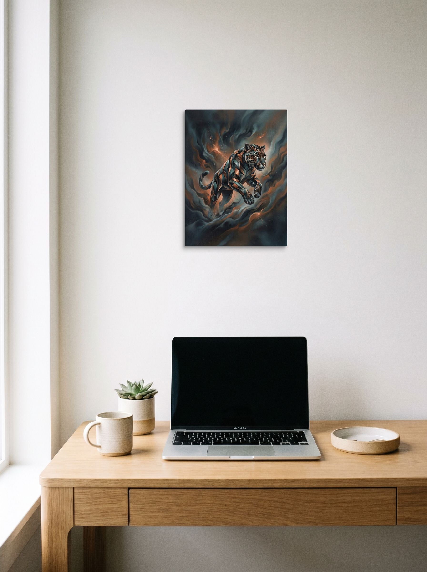 A 12x16 inch canvas Digital art print of 'Phantom Leap' hanging above a worktable with a laptop.