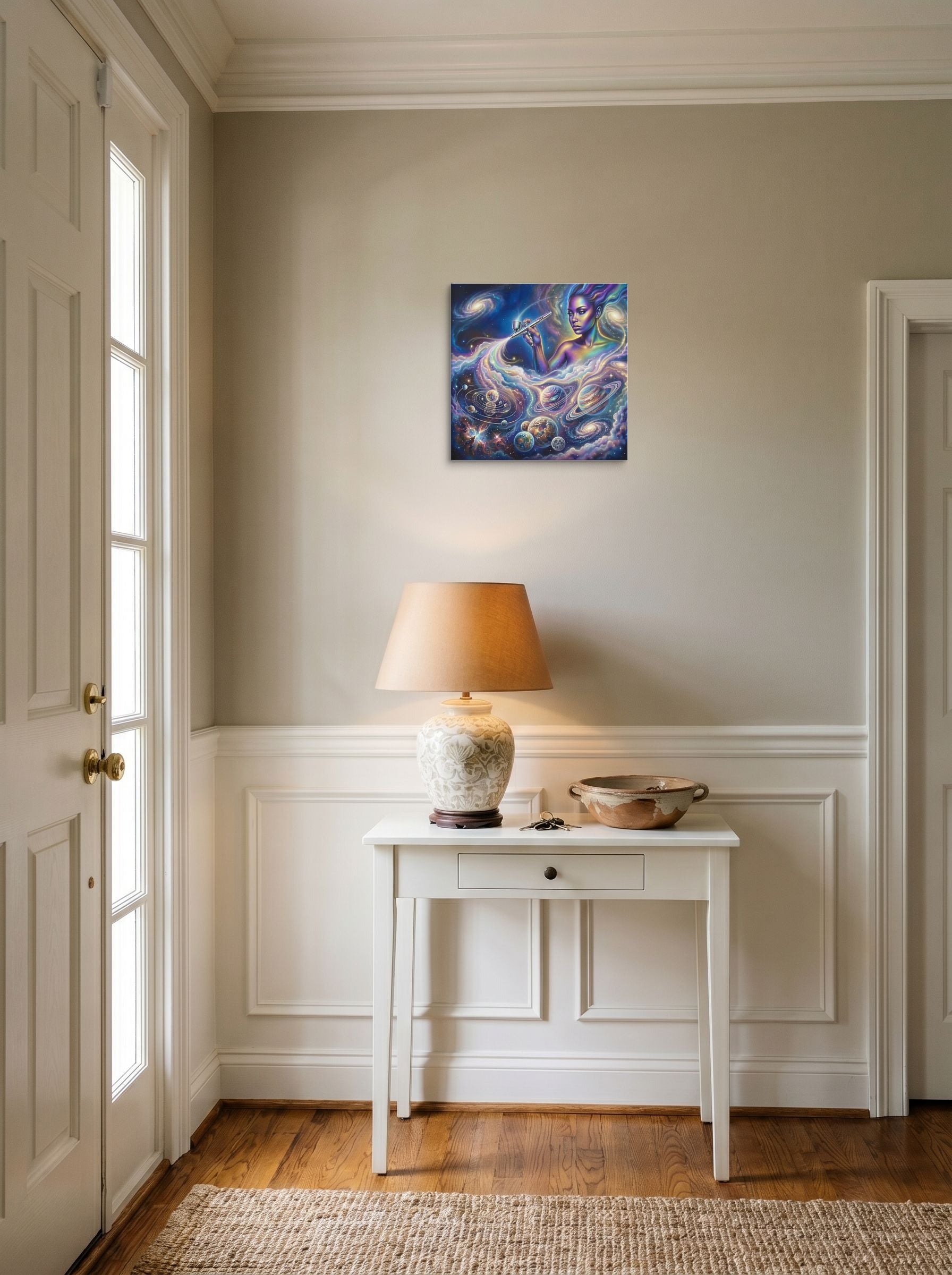 A 14x14 inch canvas Space art print of 'The Cosmic Painter' hanging in an entryway near a console.