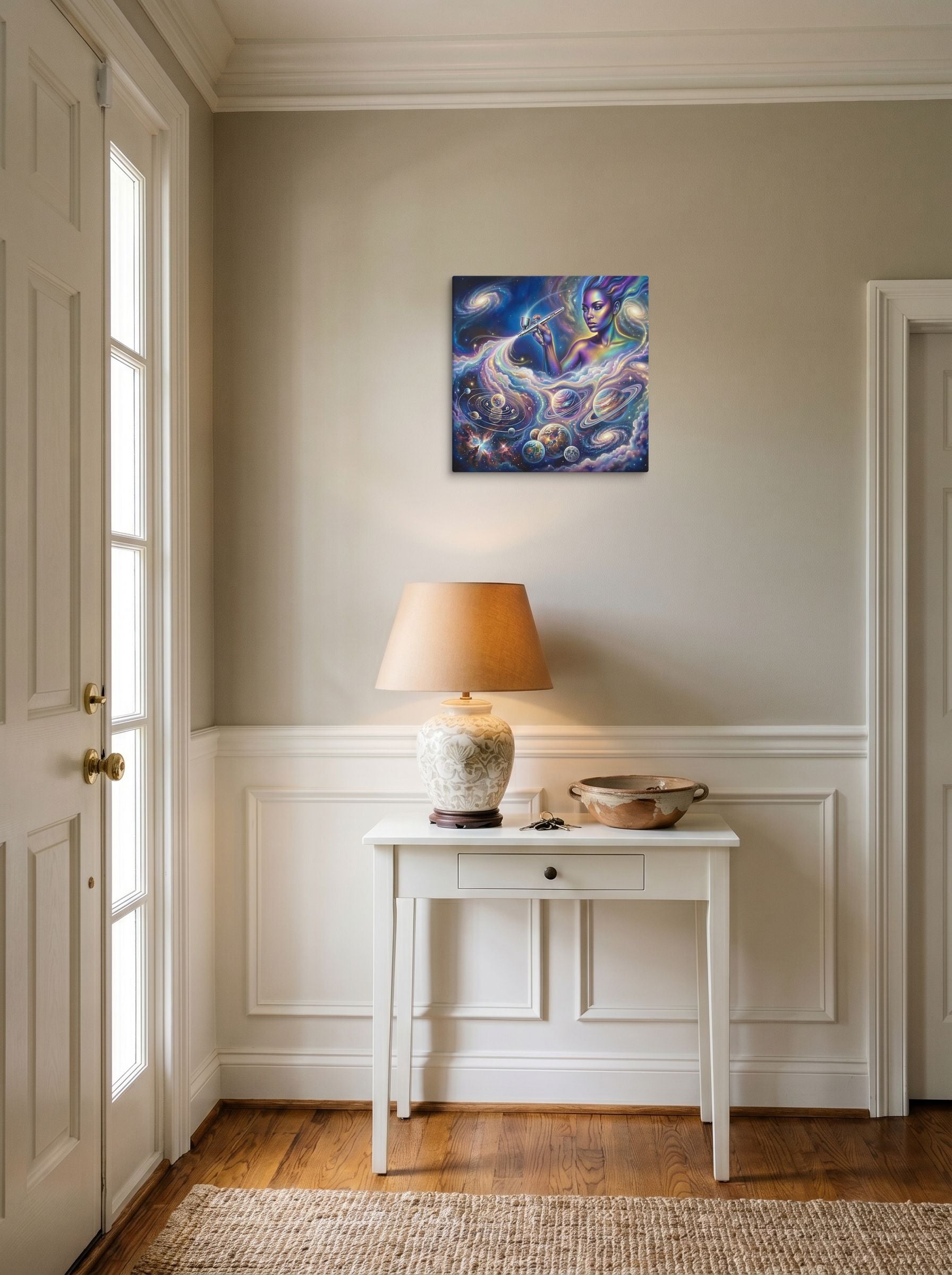 A 16x16 inch canvas Space art print of 'The Cosmic Painter' hanging in an entryway near a console.