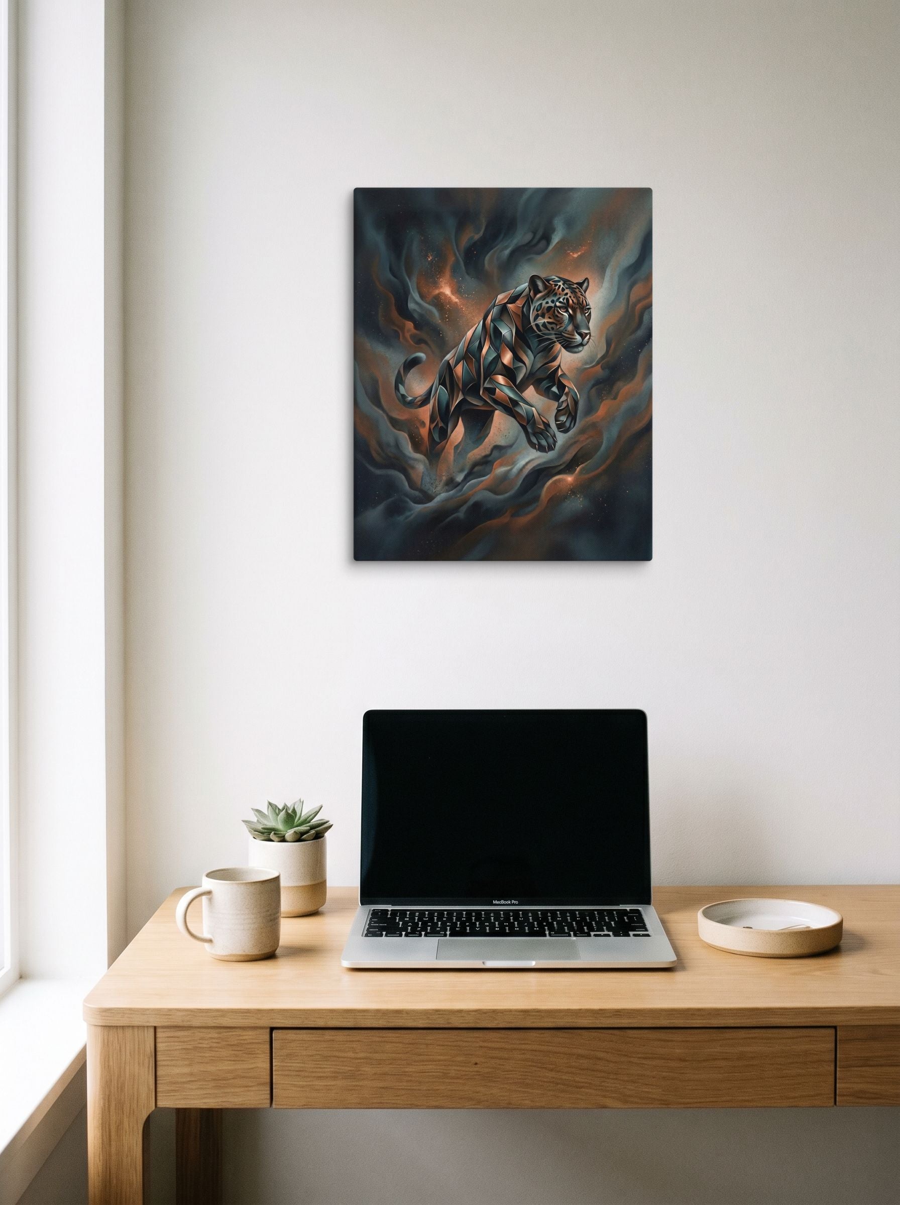 A 16x20 inch canvas Digital art print of 'Phantom Leap' hanging above a worktable with a laptop.