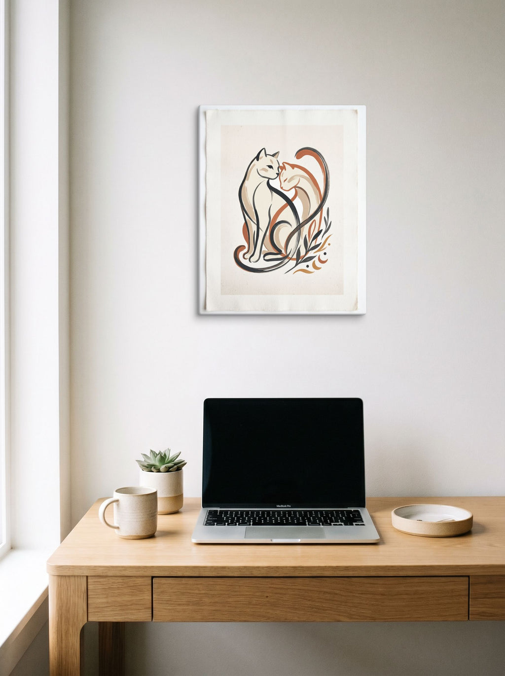 A 16x20 inch canvas Minimalism,Abstract art print of 'Feline Affection' hanging above a worktable with a laptop.