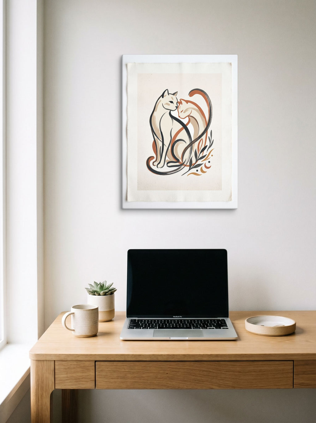 A 18x24 inch canvas Minimalism,Abstract art print of 'Feline Affection' hanging above a worktable with a laptop.