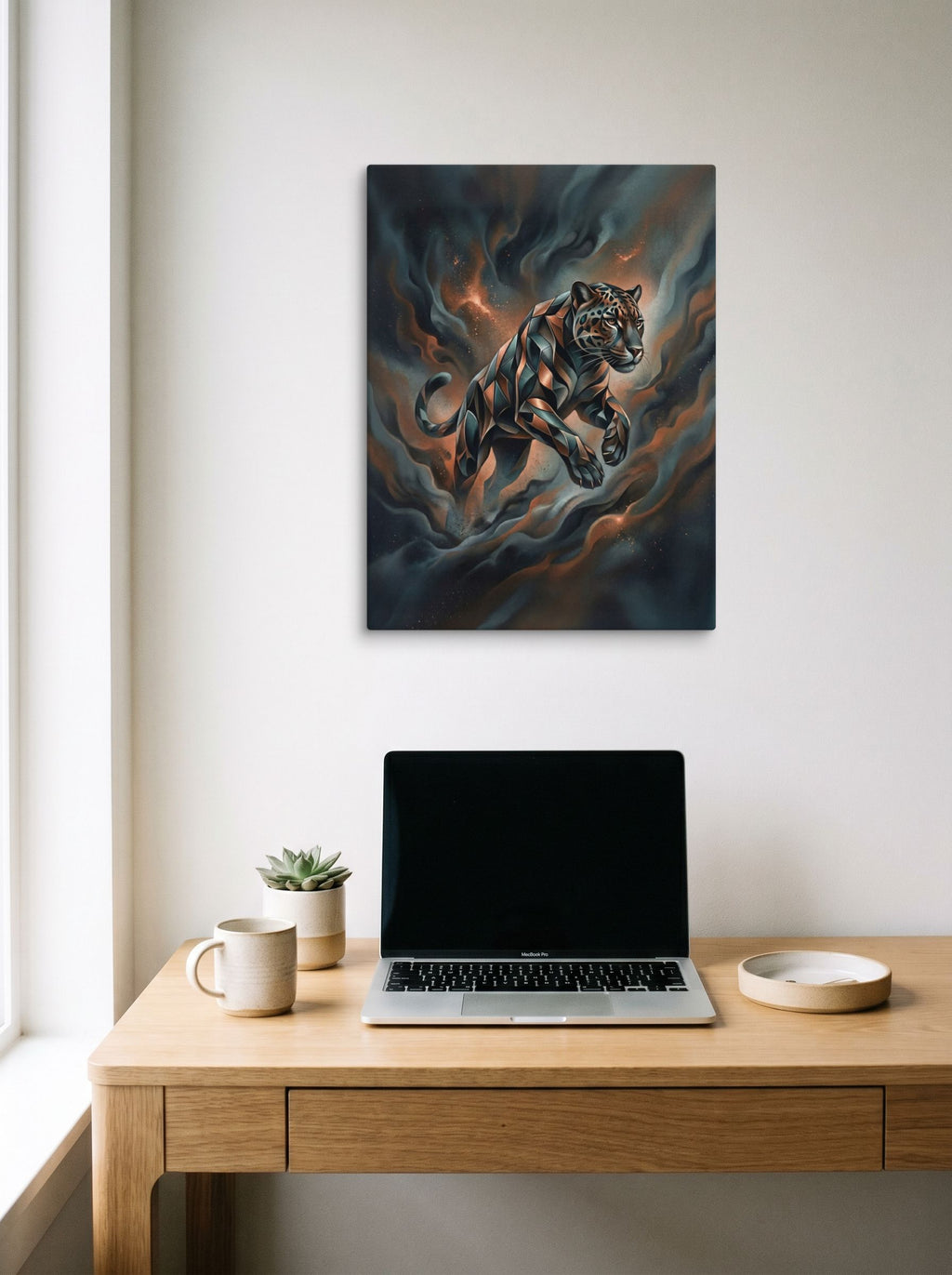 A 18x24 inch canvas Digital art print of 'Phantom Leap' hanging above a worktable with a laptop.
