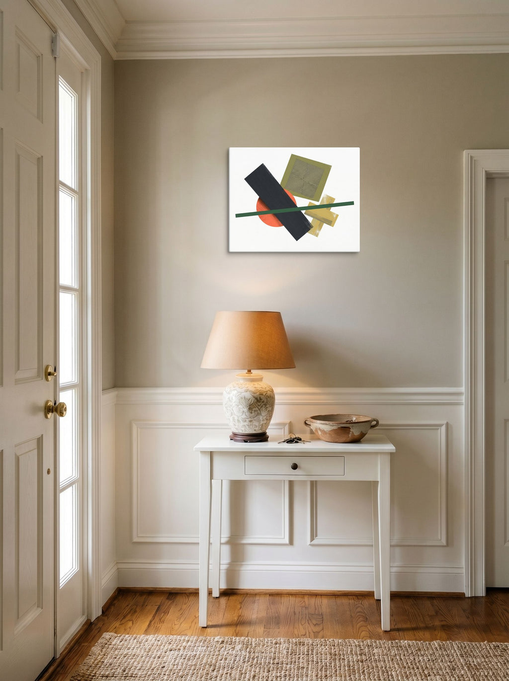 A 20x16 inch canvas Suprematism print of 'The Geometry of Sound' hanging in an entryway near a console.