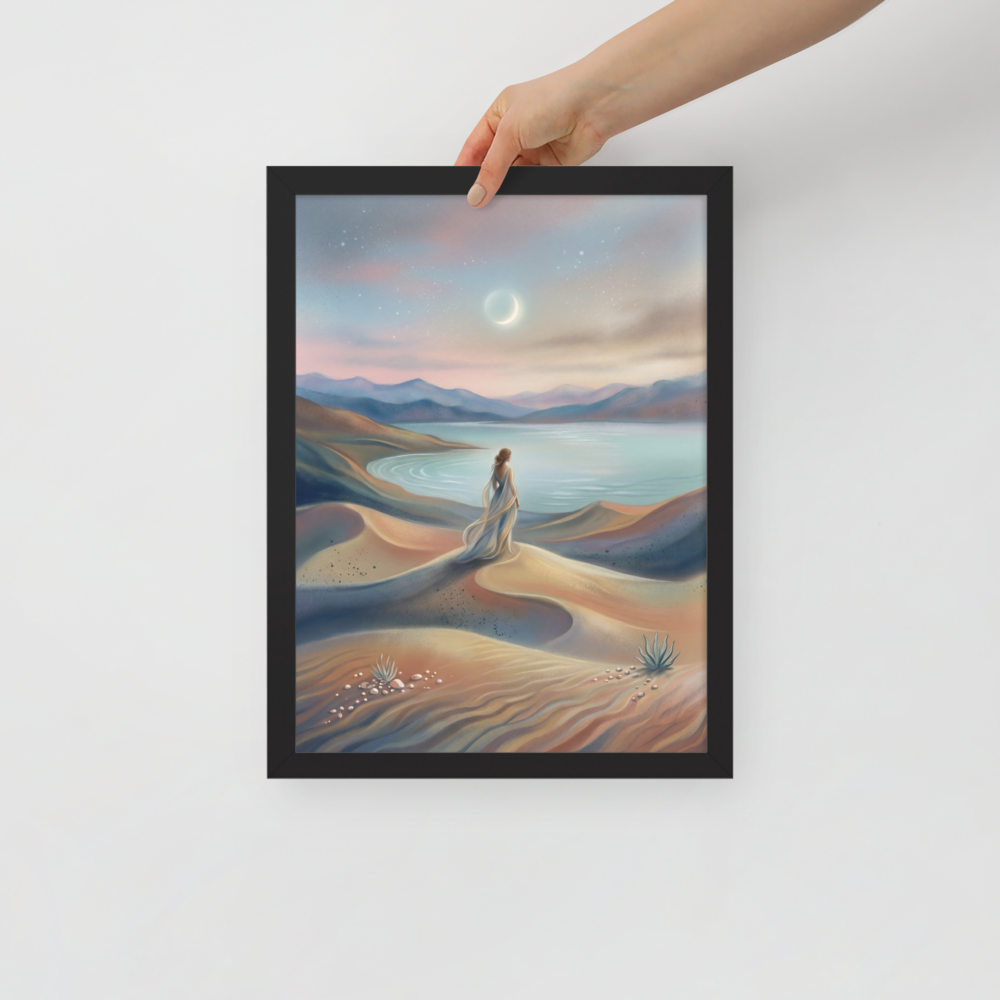 'Desert Moonrise' — a Magic realism print. A woman in a flowing dress standing on rolling sand dunes looking over a turquoise bay toward mountains under a twilight sky with a crescent moon.