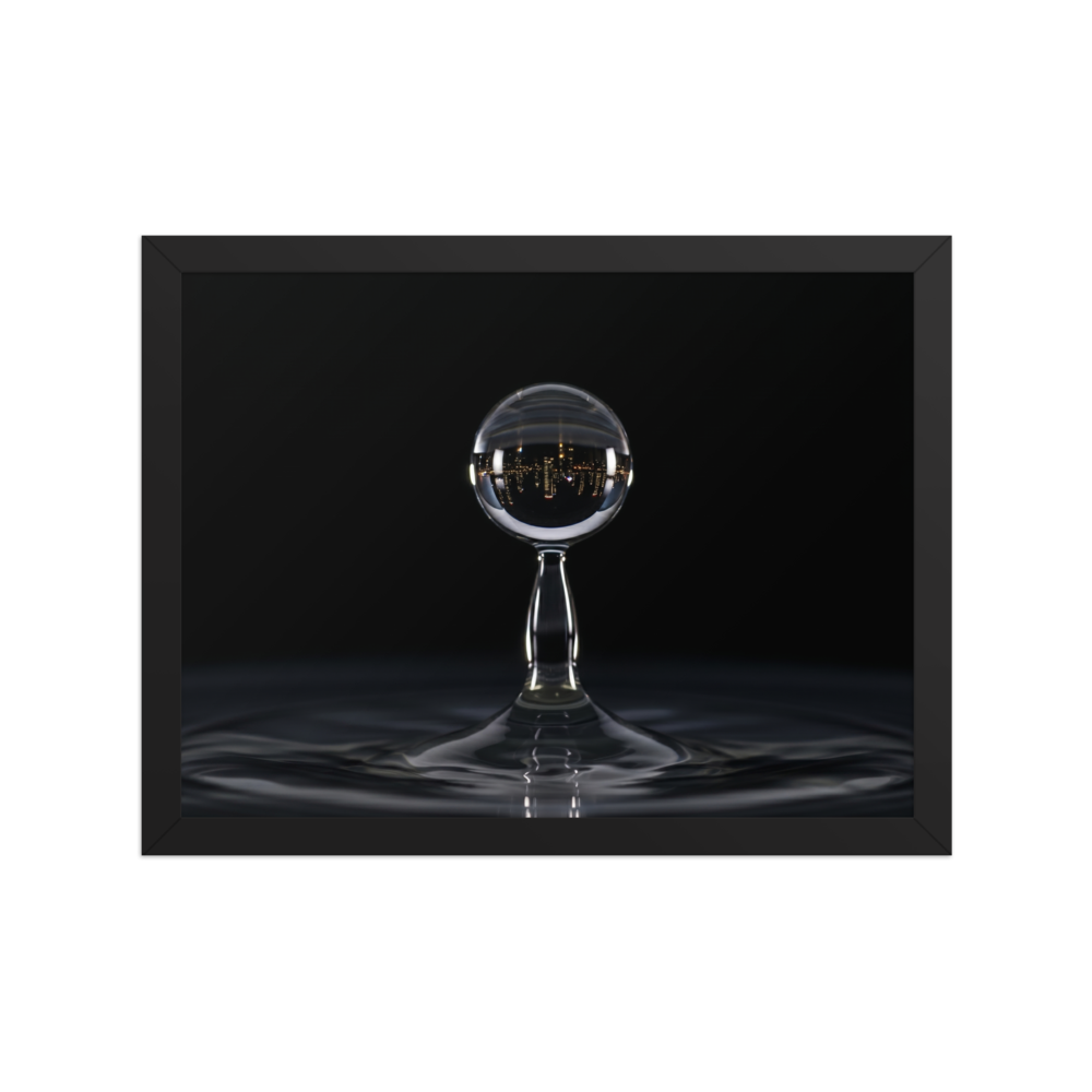 'City in a Drop' — a Surrealism print. A macro view of a water droplet splashing, containing an inverted reflection of a glowing city skyline at night.