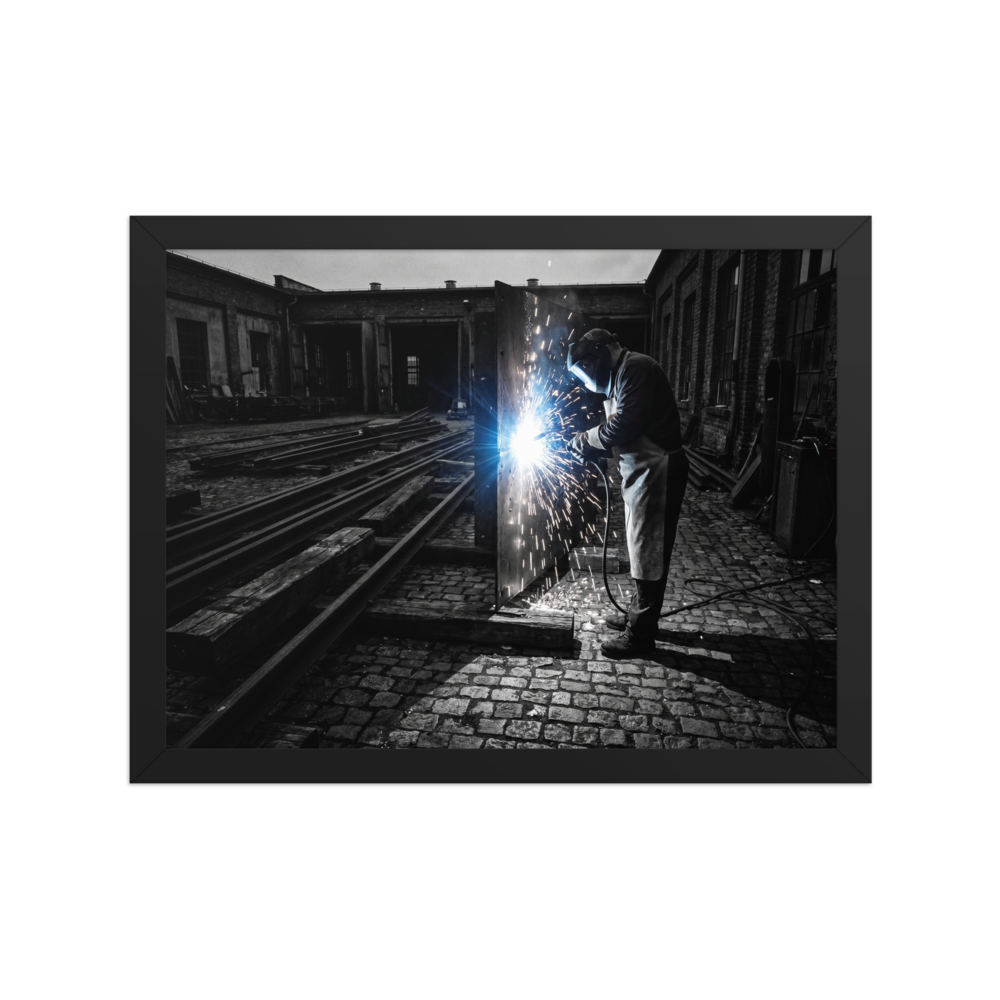 'Sparks of Labor' — a Art photography print. Dramatic high-contrast photograph of a welder generating brilliant sparks in an industrial yard, great for a garage or study.