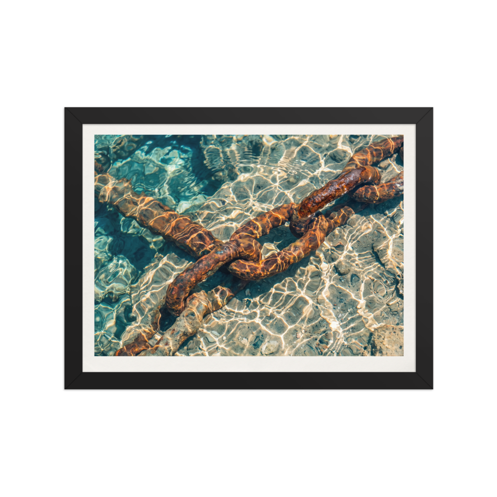 'Sunken Mooring Chain' — a Art photography print. Rusted iron mooring chain submerged in crystal clear turquoise ocean water with dancing sun ripples, ideal coastal art for a bathroom.