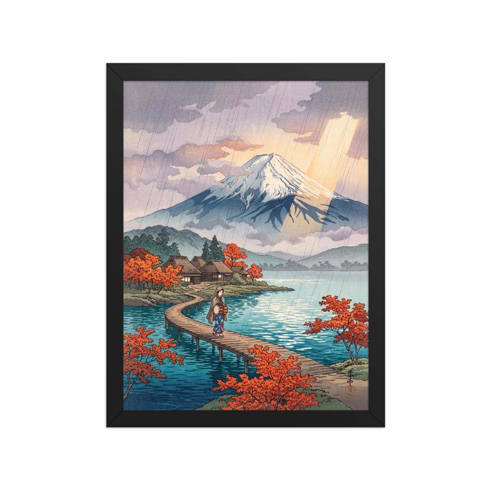 'Sunshower Over Fuji' — a Shin hanga print. A lone traveler walks across a wooden bridge on a tranquil lake toward Mount Fuji as sun rays pierce through light rainfall, ideal for an office.