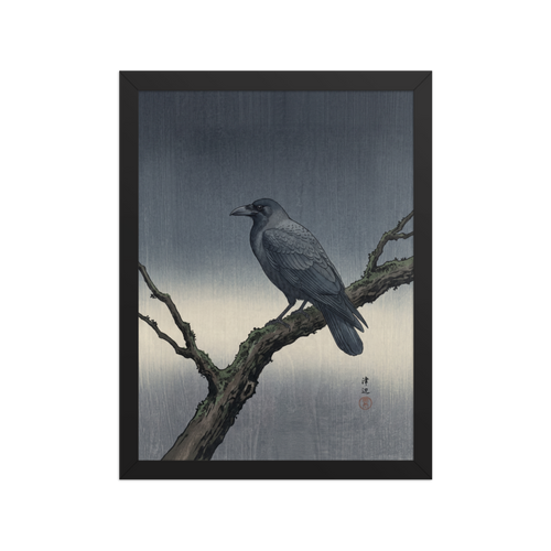 'Solitary Raven at Dusk' — a Shin hanga print. A dark raven perches on a mossy winter branch against a textured gray woodblock background, bringing a calm aesthetic to an office.