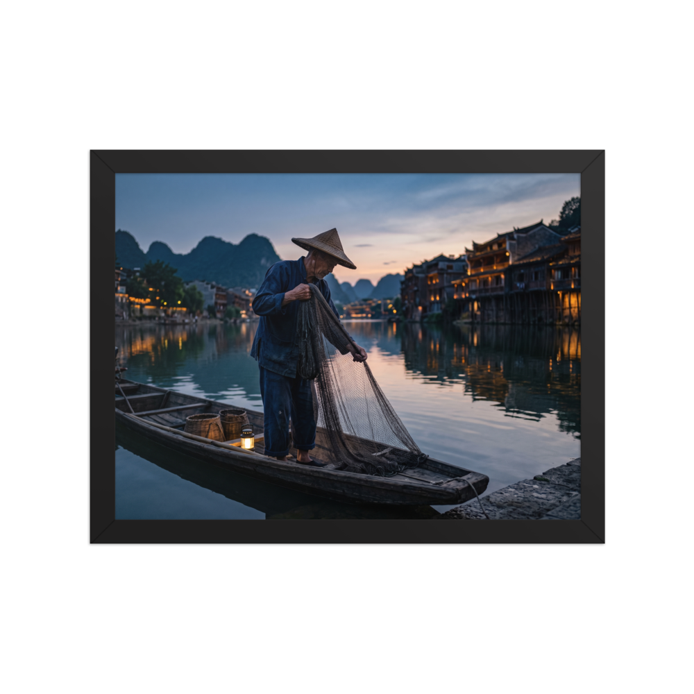'Twilight River' — a Art photography print. A fisherman gathers his net on a calm river at dusk with illuminated waterfront buildings, creating a serene mood suited for an office.
