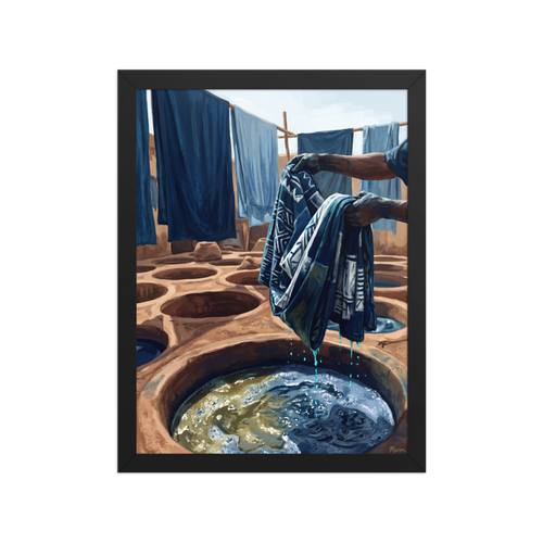 'The Indigo Dyer', part of Meron's Realism wall art. Artisan hands lifting patterned blue cloth from a sunlit clay indigo dye pit, suitable for an artist studio.