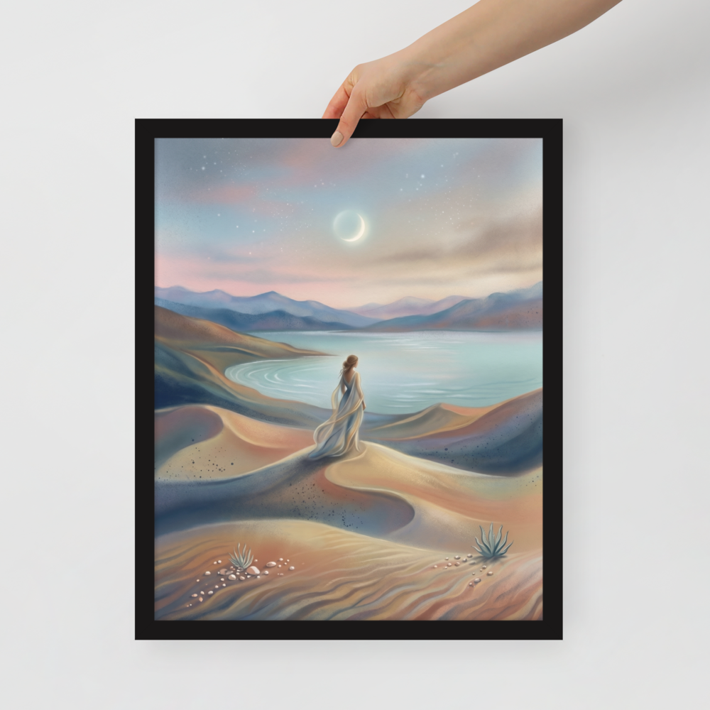 'Desert Moonrise' — a Magic realism print. A woman in a flowing dress standing on rolling sand dunes looking over a turquoise bay toward mountains under a twilight sky with a crescent moon.