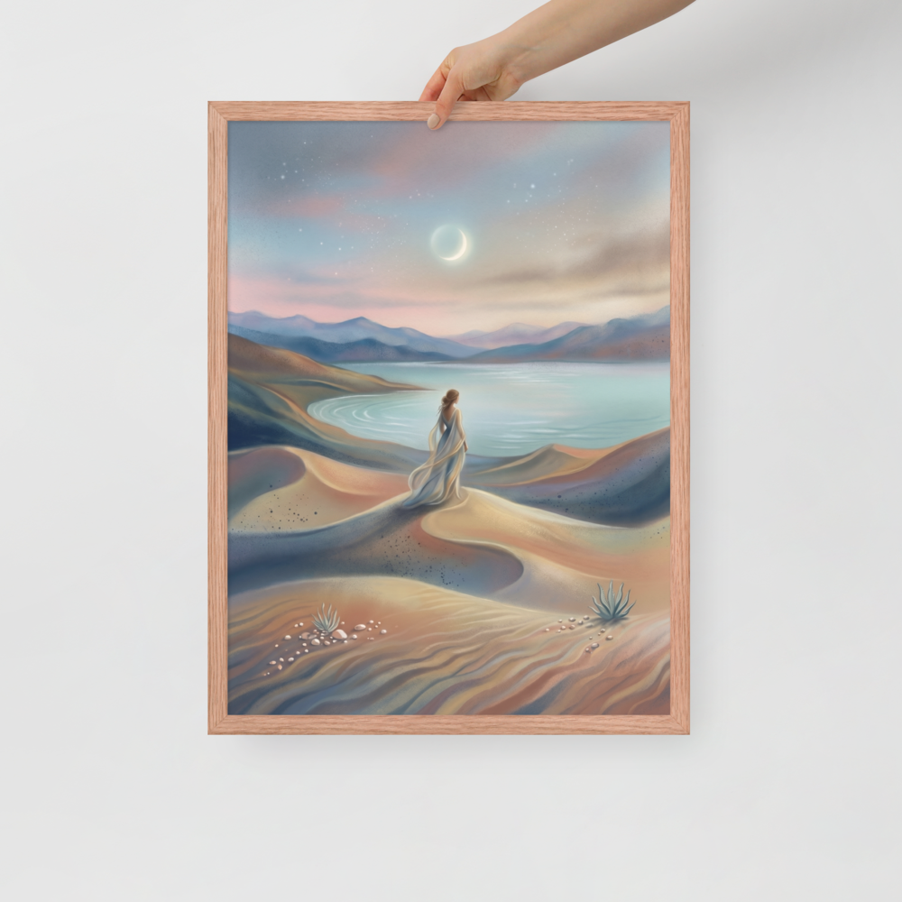'Desert Moonrise' — a Magic realism print. A woman in a flowing dress standing on rolling sand dunes looking over a turquoise bay toward mountains under a twilight sky with a crescent moon.
