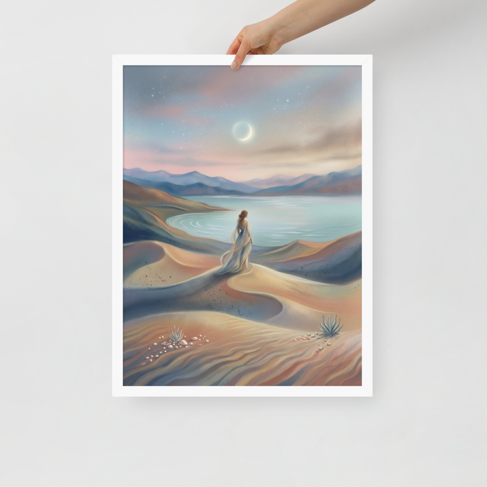 'Desert Moonrise' — a Magic realism print. A woman in a flowing dress standing on rolling sand dunes looking over a turquoise bay toward mountains under a twilight sky with a crescent moon.