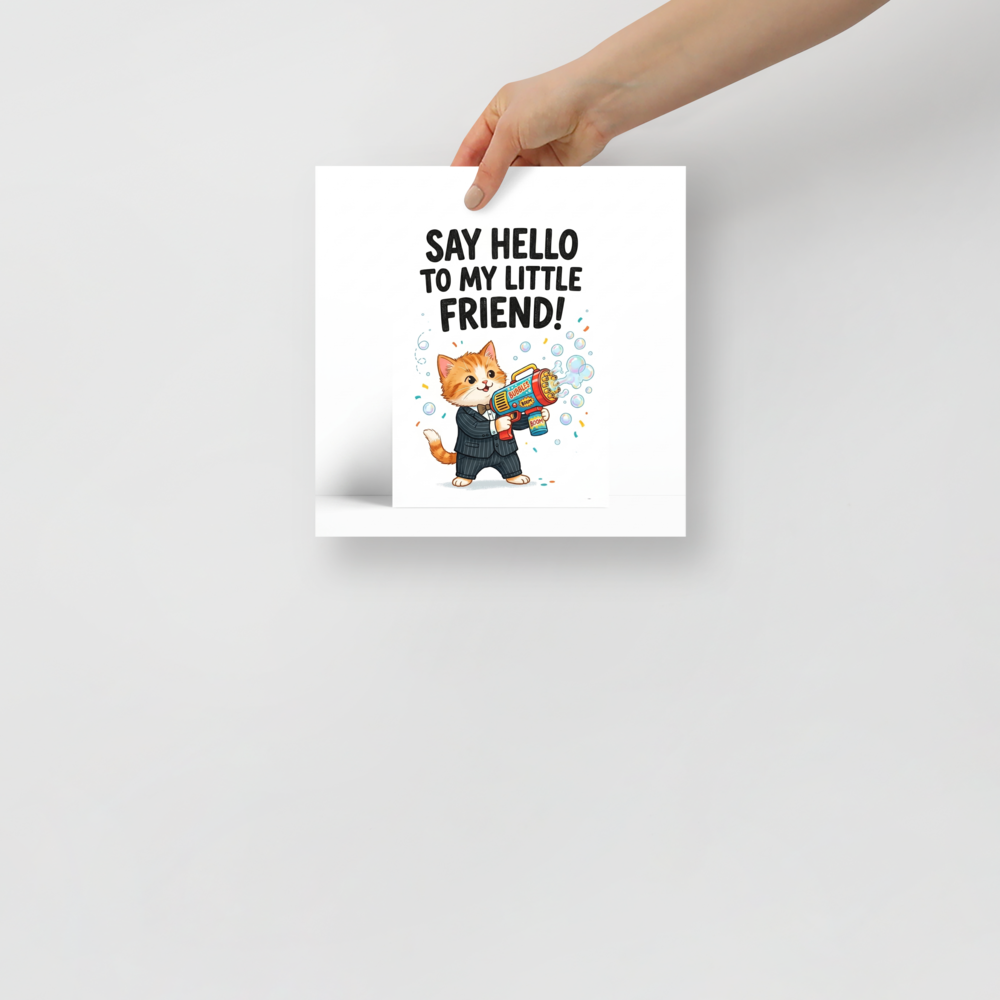'My Little Friend' — a Pop art,Digital art print. A humorous parody illustration of a cute cat in a suit holding a bubble gun with the text 'Say hello to my little friend!'.