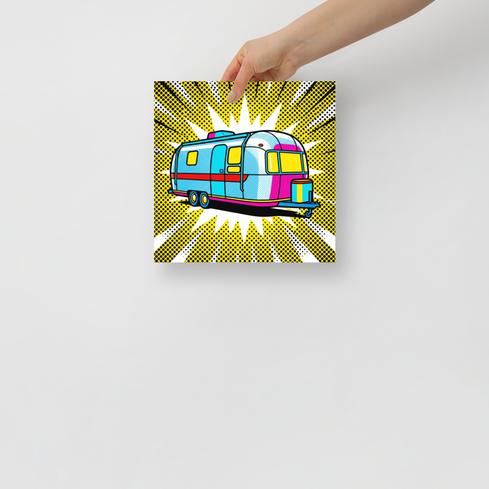 'Pop Art Camper' — a Pop art print. A brightly colored pop art illustration of a retro camper trailer in cyan, magenta, and yellow against a starburst background with halftone dots, perfect for a Camper / RV.