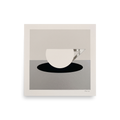 'The Abstract Cup' — a Art Deco print. A minimalist geometric painting of a white cup with an angular silver handle resting on a black oval, ideal for a modern kitchen.
