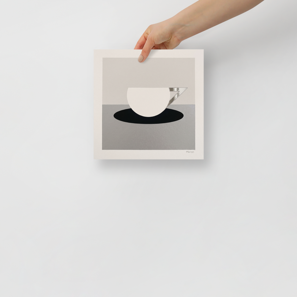'The Abstract Cup' — a Art Deco print. A minimalist geometric painting of a white cup with an angular silver handle resting on a black oval, ideal for a modern kitchen.