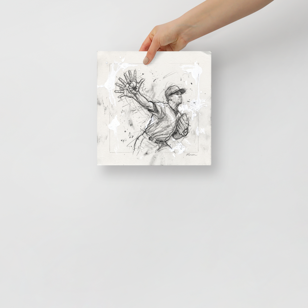 Dynamic graphite sports sketch of a baseball pitcher releasing a pitch with white paint splatters, ideal for game room wall art. A striking piece titled 'Pitcher's Release'.