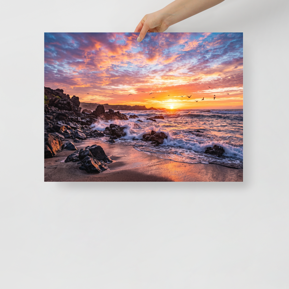 'Coastal Fire' — a Art photography print. A vibrant photograph of a sunset over a rocky beach with crashing waves and birds flying in the distance, a beautiful piece for a Living Room.