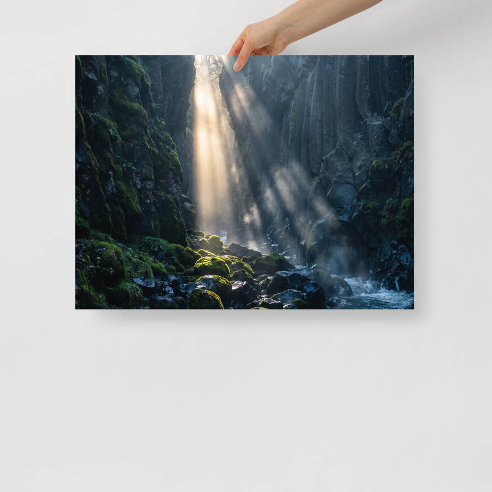 'Sunbeams in the Gorge' — a Art photography print. Golden sunbeams filtering down into a mossy volcanic canyon gorge, serene nature decor for a calming bedroom.