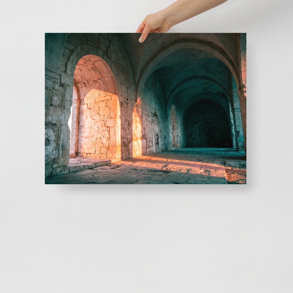 'Arches at Sunset' — a Art photography print. Ancient stone arches illuminated by warm sunset light with cool shadowed corridors, elegant architectural art for a hallway.