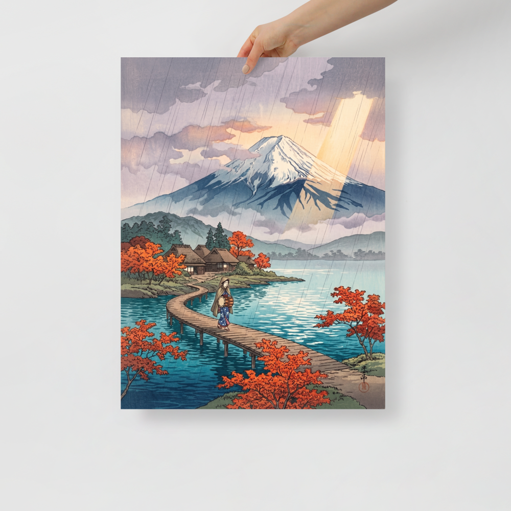 'Sunshower Over Fuji' — a Shin hanga print. A lone traveler walks across a wooden bridge on a tranquil lake toward Mount Fuji as sun rays pierce through light rainfall, ideal for an office.