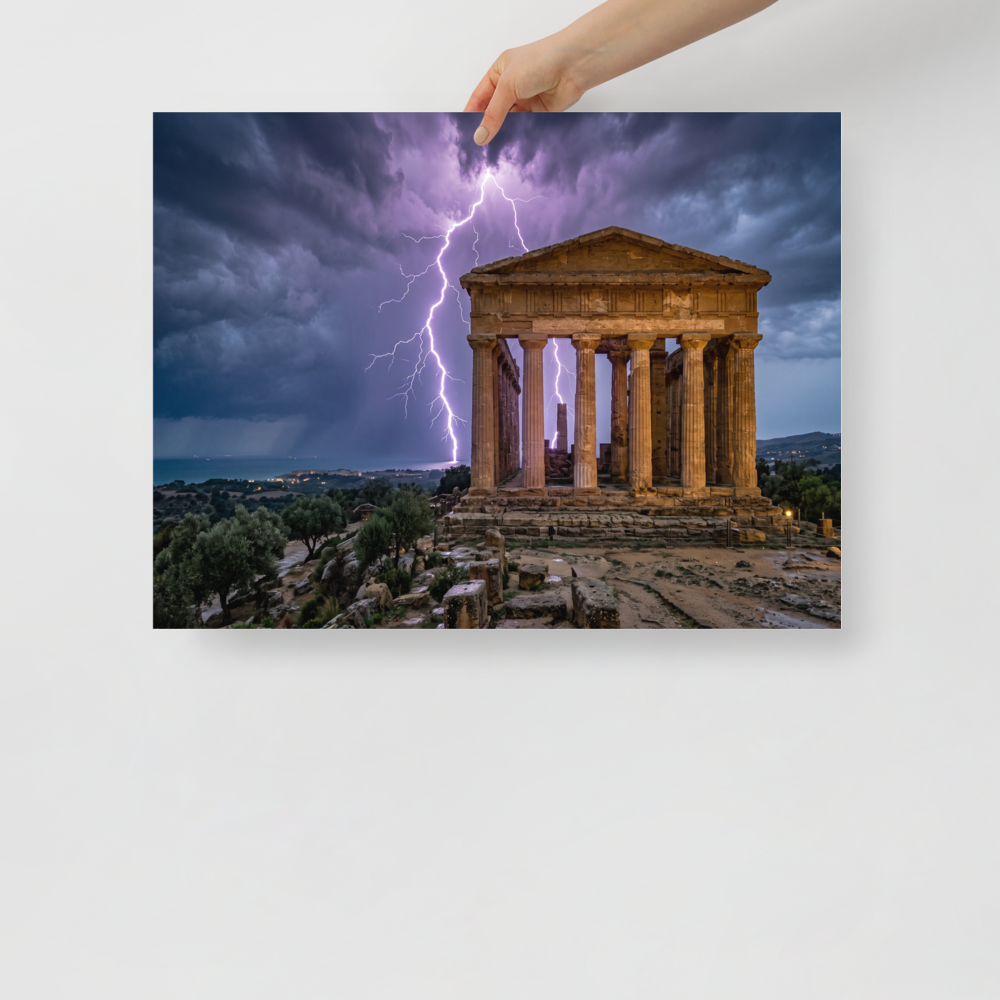 'Wrath of Olympus' — a Art photography print. A breathtaking photograph of violet lightning bolts striking behind an ancient classical temple ruin overlooking the sea, perfect for a dramatic study or living room.