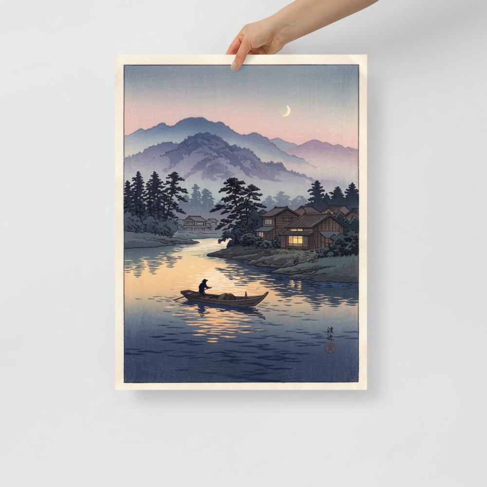 'Moonlit River Crossing' — a Shin hanga print. A lone boatman rows across a calm river reflecting twilight colors and warm cabin window light beneath misty mountains, perfect for a living room.