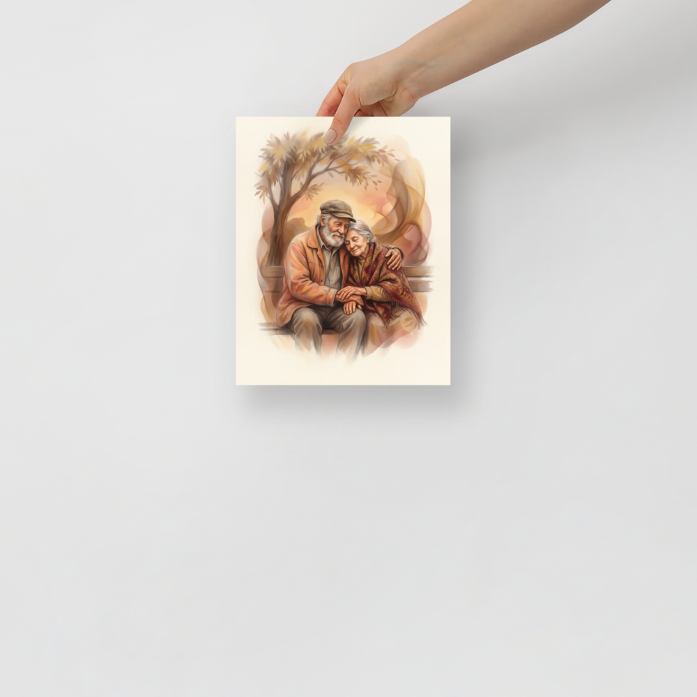 'Autumn Affection' — a Realism print. An elderly couple embraces warmly on a park bench beneath an autumn tree, making this piece a heartwarming addition to a cozy living room.