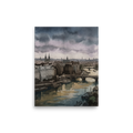 'Twilight Over the Seine' — a Impressionism print. A moody cityscape with a river, bridges, and historical buildings under a dramatic sky, perfect for an Office or Library.