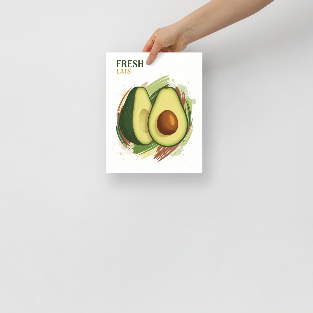 'Fresh Eats Avocado' — a Pop art,Digital art print. An appetizing illustration of an avocado half with watercolor brushstrokes and 'Fresh Eats' text, a lively addition to a Kitchen.