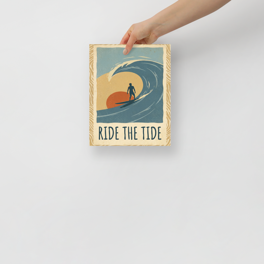 'Ride the Tide' — a Pop art,Digital art print. A vintage illustration of a surfer riding a large wave against a warm sunset with the text 'Ride The Tide', a nostalgic piece for a Living Room.