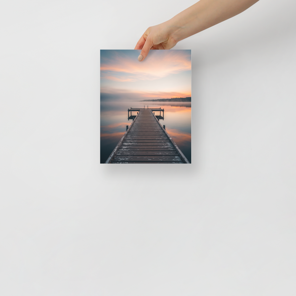 'Pastel Dawn Pier' — a Art photography print. Symmetrical landscape photograph of a wooden dock extending into a calm, misty lake reflecting a colorful sunrise, perfect for a peaceful bedroom or office space.