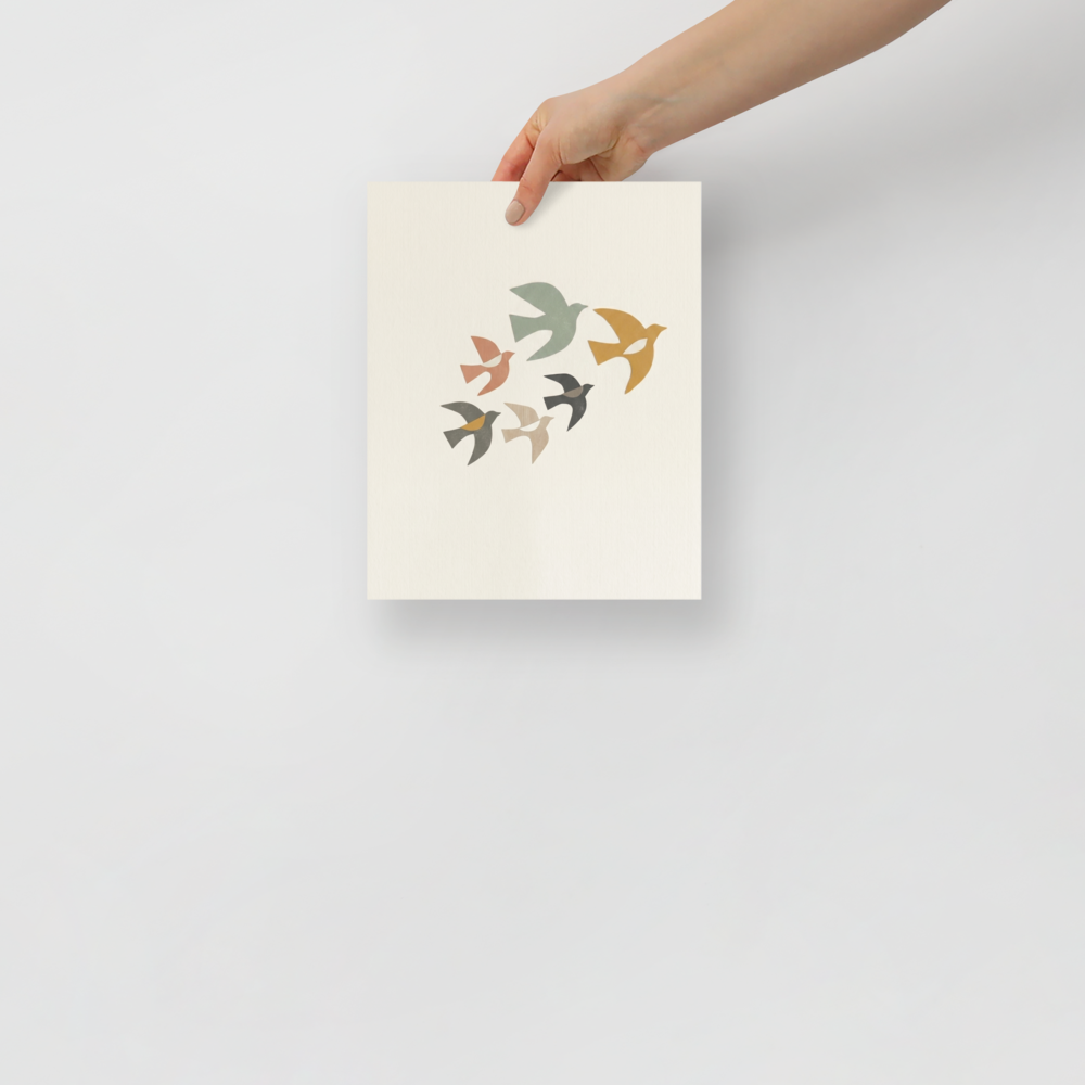 'The Minimalist Flock' — a Minimalism,Abstract art print. An abstract minimalist artwork showing a flock of birds in flight, rendered as geometric cutouts in sage, rust, and gold on a textured cream background, perfect for a Nursery.