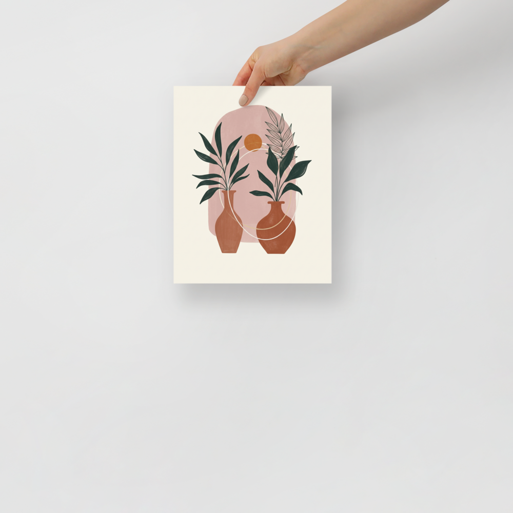 'Desert Oasis Botanicals' — a Minimalism print. Minimalist boho art featuring terracotta vases with green plants against a dusty pink arch and a small orange sun.