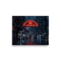'Rainy Night on Nathan Road' — a Realism print. A vibrant red neon sign reading Nathan Rd glows over a rainy street corner in Hong Kong, with double decker buses and people holding umbrellas, perfect for an office or living room.